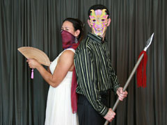 Woman with veil and fan, Man with dragon mask and spear