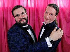 Two Men in Dapper Suits Smiling at the Camera